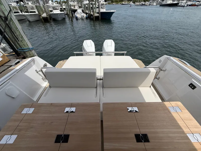 Slide: The Image of 2025 Fjord 39 XP yacht with dual engines, docked at a marina. - 26