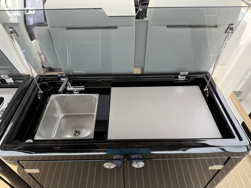 Slide: The Image of Modern kitchen sink and countertop on 2025 Fjord 39 XP yacht. - 41