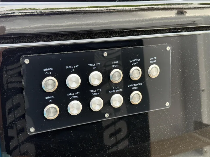Slide: The Image of Control panel on a 2025 Fjord 39 XP yacht with various function buttons. - 48