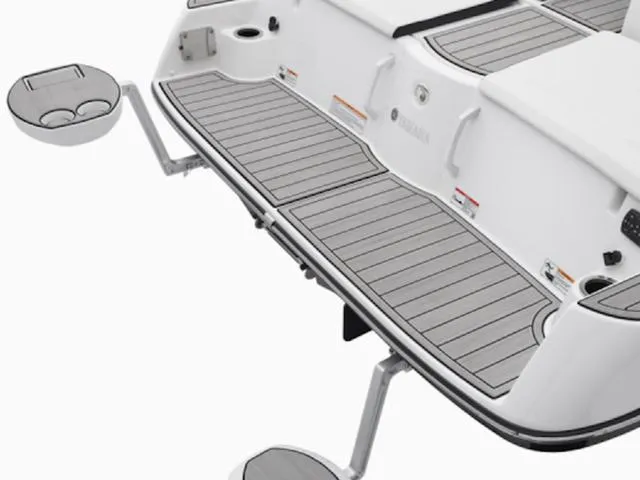 Slide: The Image of 2025 Yamaha Boats 222SD swim platform with sleek design and integrated cup holders. - 6