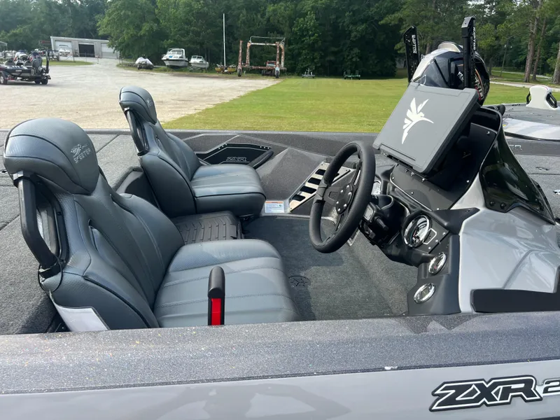 Slide: The Image of Interior of a 2025 Skeeter ZXR 21 boat with sleek seating and modern dashboard. - 4