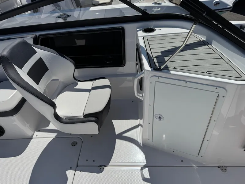 Slide: The Image of 2025 Yamaha Boats 195S interior with sleek seating and modern dashboard design. - 14
