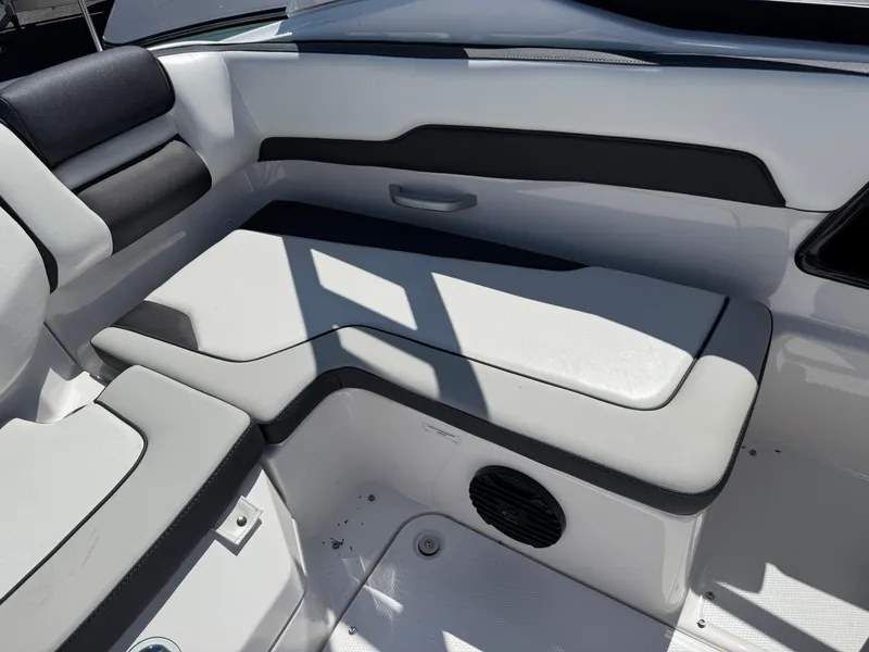 Slide: The Image of 2025 Yamaha Boats 195S interior seating with sleek design and modern upholstery. - 16