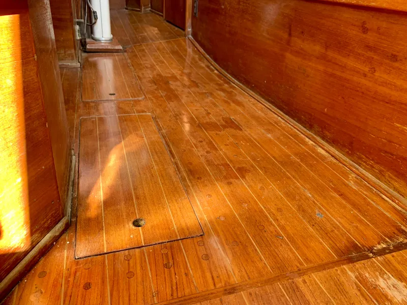 Slide: The Image of Polished wooden interior of a 1986 Sabre 36 sailboat, showcasing elegant craftsmanship. - 32