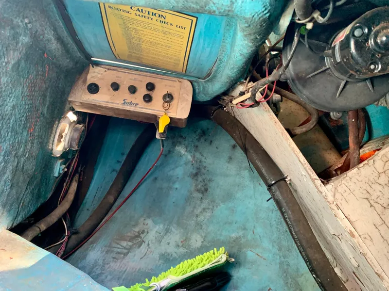 Slide: The Image of 1986 Sabre 36 boat interior with control panel and wiring. - 48