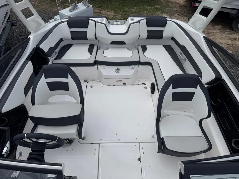 Slide: The Image of 2025 Yamaha Boats 195S interior with sleek seating and modern design. - 10