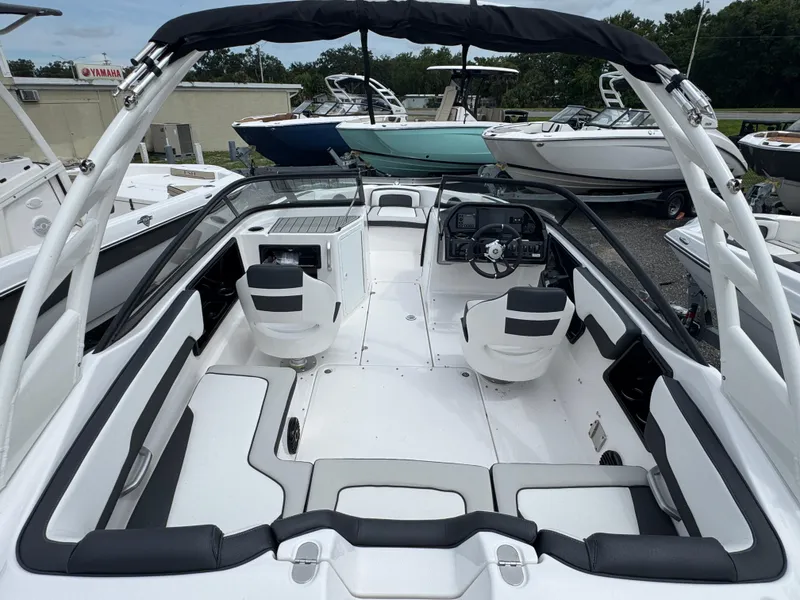 Slide: The Image of 2025 Yamaha Boats 195S interior with sleek seating and modern dashboard design. - 3