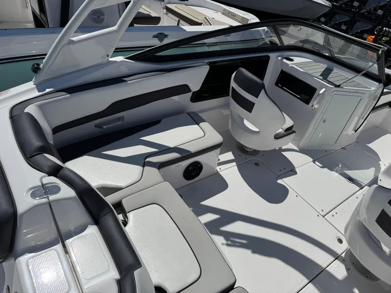 Slide: The Image of 2025 Yamaha Boats 195S interior with sleek seating and modern dashboard design. - 4