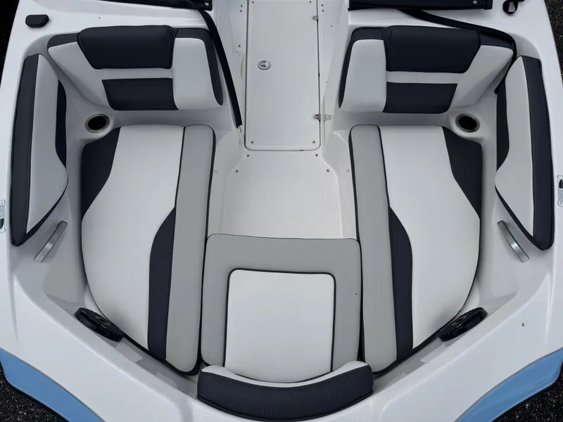 Slide: The Image of 2025 Yamaha Boats 195S interior seating, featuring sleek black and white upholstery design. - 9