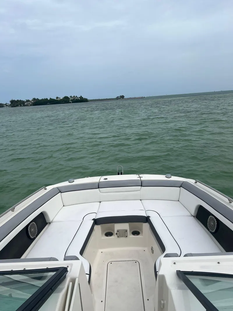 Slide: The Image of 2017 Sea Ray SDX 290 Outboard boat on open water, view from bow. - 19