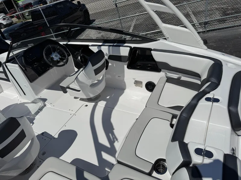 Slide: The Image of 2025 Yamaha Boats 195S interior with sleek seating and modern dashboard design. - 5