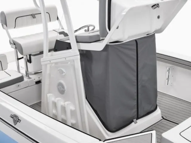 Slide: The Image of 2025 Yamaha Boats 195 FSH Sport interior, featuring seating and storage area. - 6