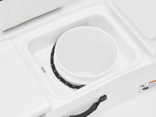 Slide: The Image of 2025 Yamaha Boats 195 FSH Sport storage compartment with a circular insert. - 9