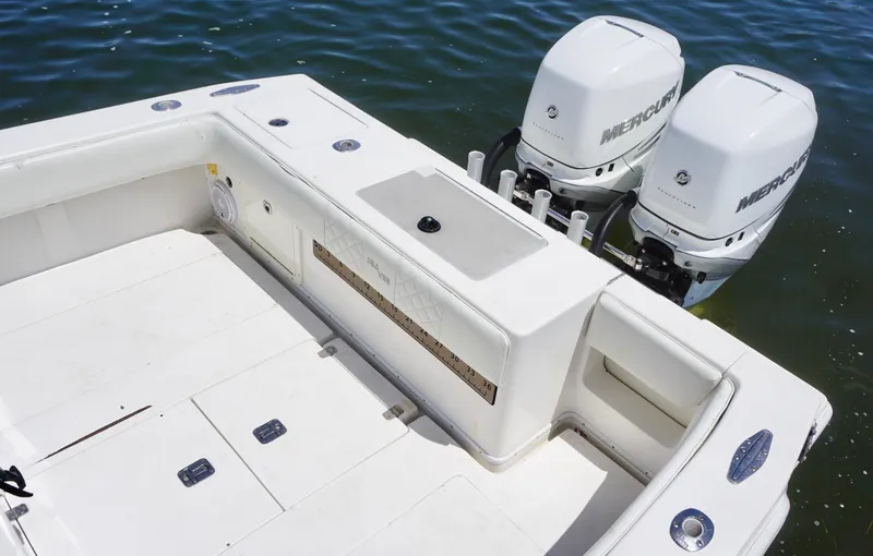 Slide: The Image of 2009 SeaVee 32OB boat with dual Mercury outboard engines on calm water. - 18