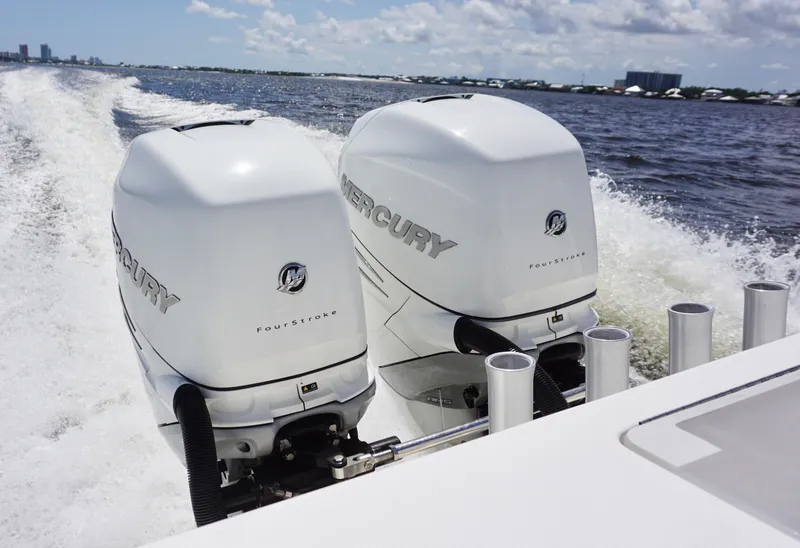 Slide: The Image of 2009 SeaVee 32OB boat with twin Mercury outboard engines cruising on open water. - 20