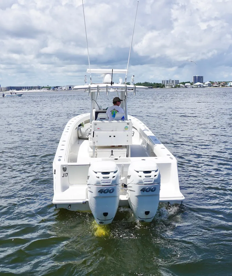 Slide: The Image of 2009 SeaVee 32OB boat with dual engines on open water. - 25