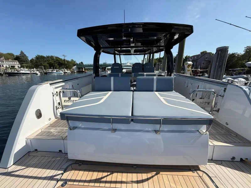 Slide: The Image of 2025 Fjord 41 XP luxury yacht with spacious deck and seating area. - 19