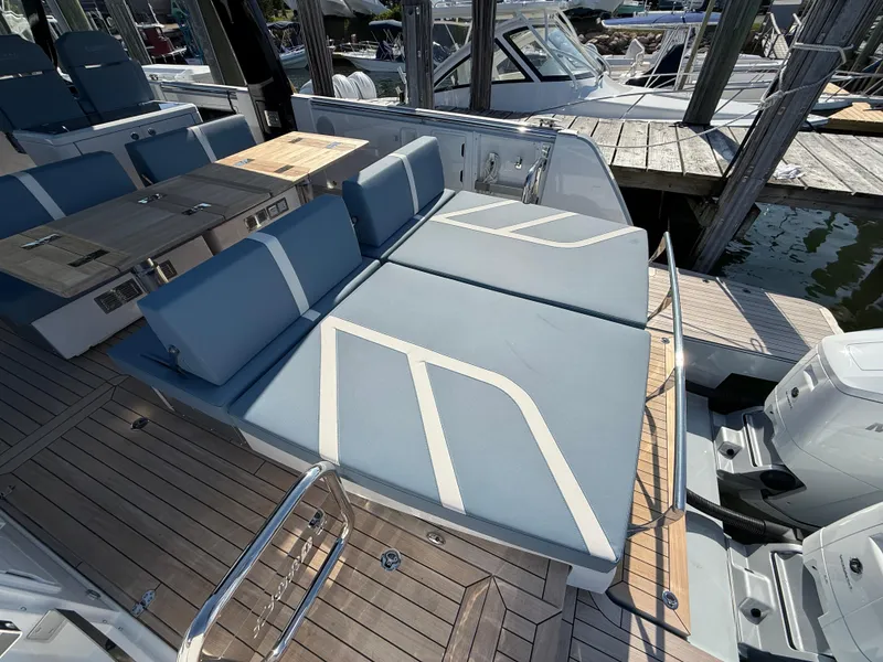 Slide: The Image of Luxurious 2025 Fjord 41 XP yacht with spacious sunbathing area and sleek design. - 22