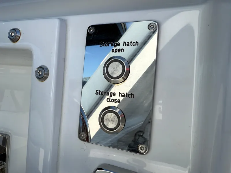 Slide: The Image of Control panel on 2025 Fjord 41 XP yacht for storage hatch operation. - 24
