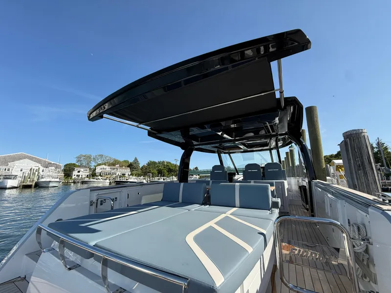 Slide: The Image of 2025 Fjord 41 XP yacht with sleek design, spacious deck, and modern seating. - 32