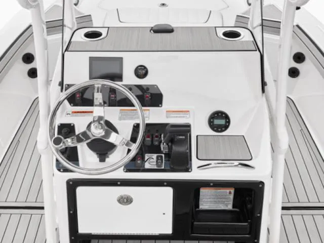 Slide: The Image of 2025 Yamaha Boats 195 FSH Sport dashboard with steering wheel and controls, featuring modern design. - 6