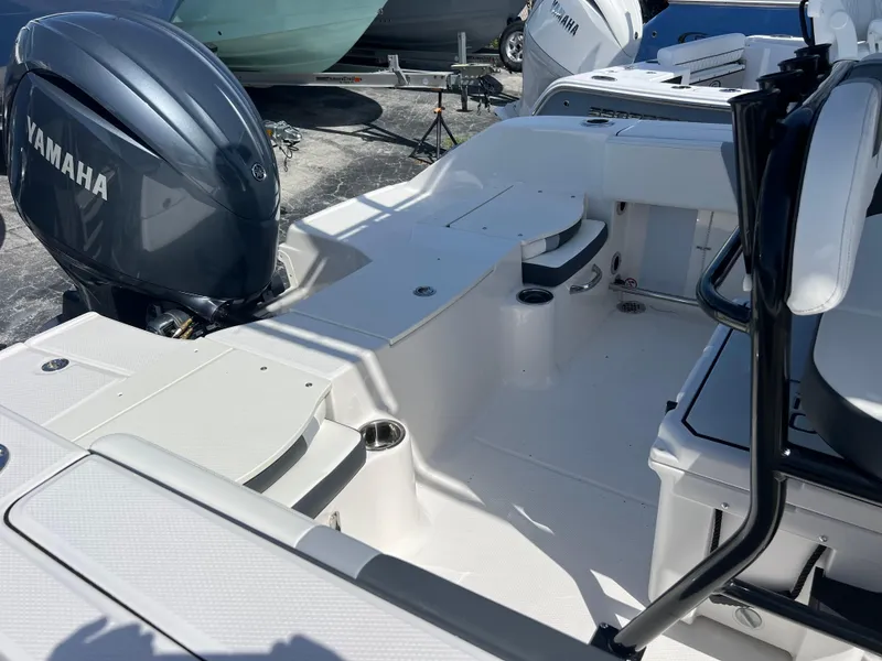Slide: The Image of 2025 Robalo R200 Center Console boat with Yamaha engine, featuring spacious deck layout. - 19