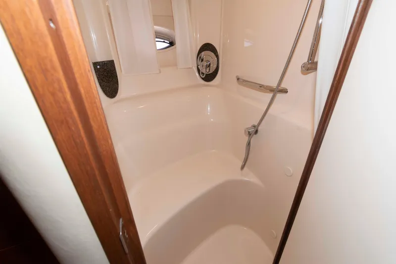 Slide: The Image of Luxurious cabin interior of 2007 Sea Ray 44 Sundancer yacht with cozy bed. - 17