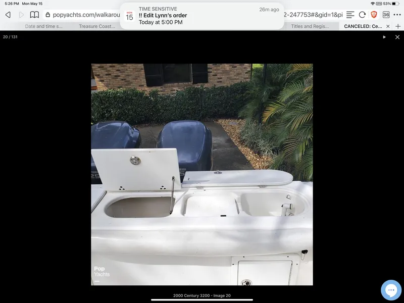 Slide: The Image of 2000 Century 3200 WA boat interior with open storage compartments. - 10