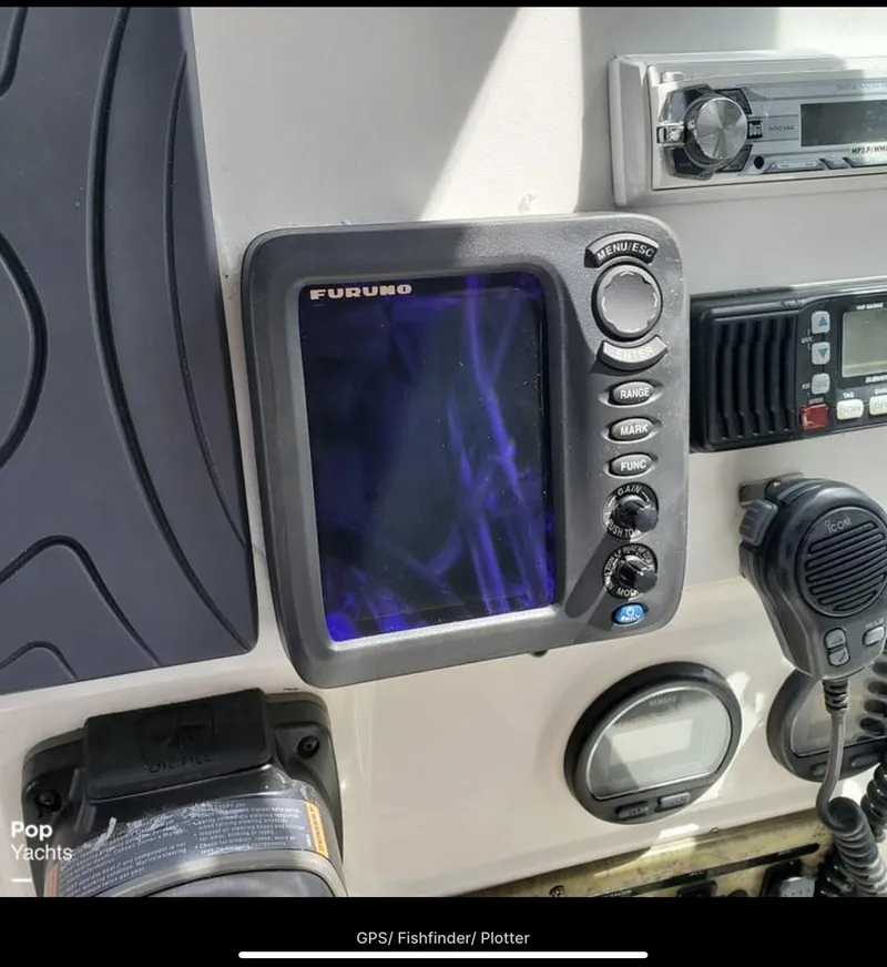 Slide: The Image of Century 3200 WA 2000 boat dashboard with Furuno GPS and communication equipment. - 13