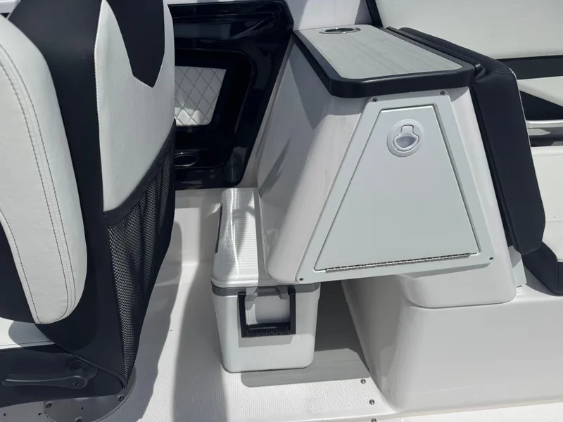 Slide: The Image of 2025 Yamaha Boats 252S interior detail with sleek seating and storage design. - 15