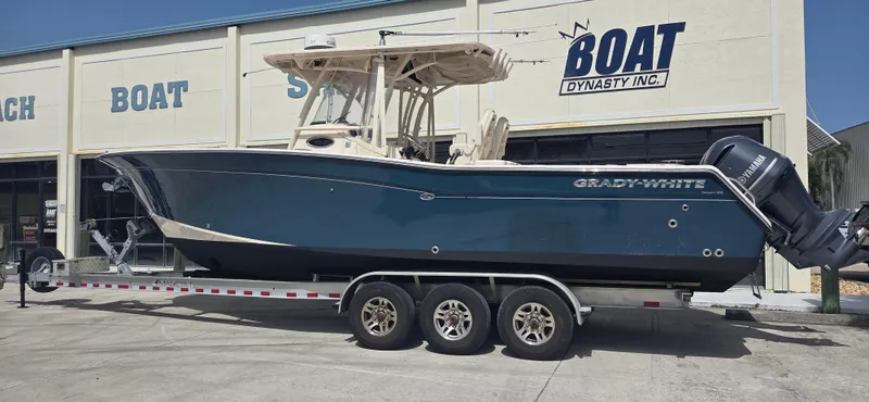 The Image of 2016 Grady-White Canyon 306 boat on trailer outside dealership. - 0