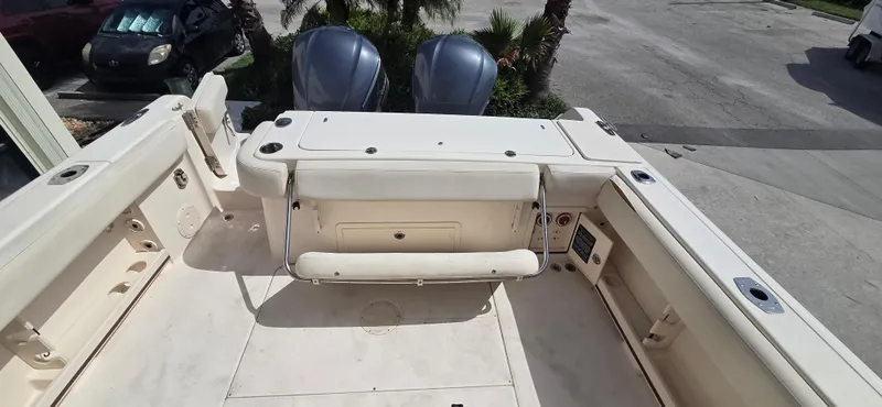 Slide: The Image of 2016 Grady-White Canyon 306 boat deck with dual outboard motors. - 11