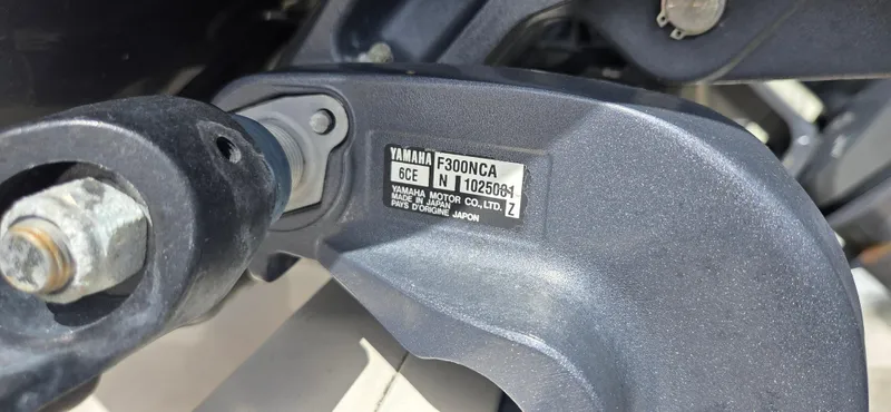 Slide: The Image of Close-up of Yamaha F300NCA engine part on 2016 Grady-White Canyon 306 boat. - 25