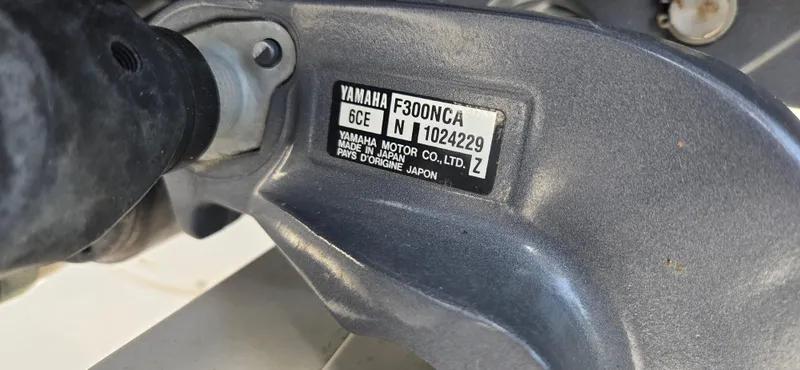 Slide: The Image of Yamaha F300NCA engine label on a 2016 Grady-White Canyon 306 boat. - 26