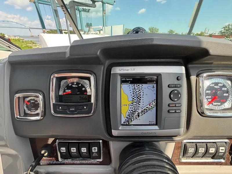 Slide: The Image of Dashboard of 2013 Chaparral 246 SXI boat with Garmin GPS and gauges. - 9