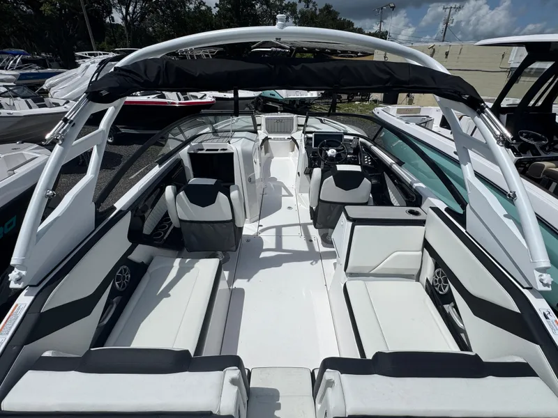 Slide: The Image of 2025 Yamaha Boats 252S interior, featuring sleek seating and modern design elements. - 4