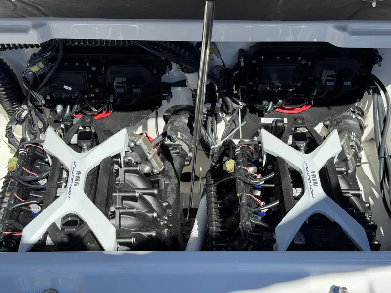 Slide: The Image of 2025 Yamaha Boats 252S engine compartment with dual engines and wiring. - 36