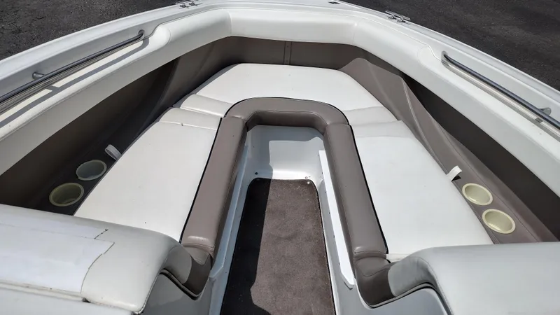 Slide: The Image of 1999 Cobalt 226 boat dashboard with steering wheel and instrument panel. - 18