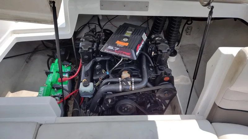 Slide: The Image of Interior of a 1999 Cobalt 226 boat showing steering wheel and control panel. - 20