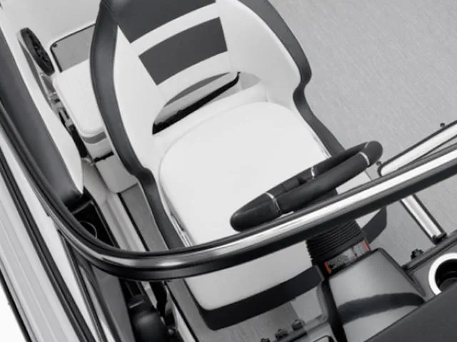 Slide: The Image of 2025 Yamaha Boats SX195 cockpit with sleek steering and modern seating design. - 22