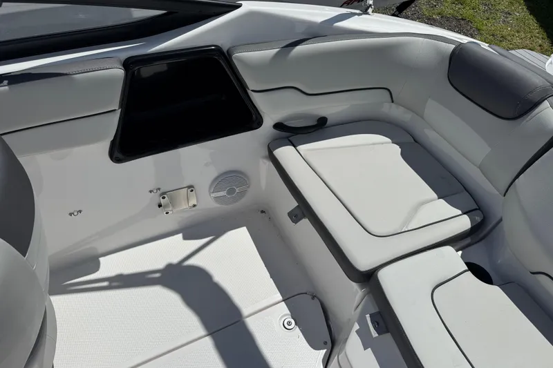 Slide: The Image of Interior seating of 2025 Yamaha Boats SX190, featuring white cushioned seats and sleek design. - 14