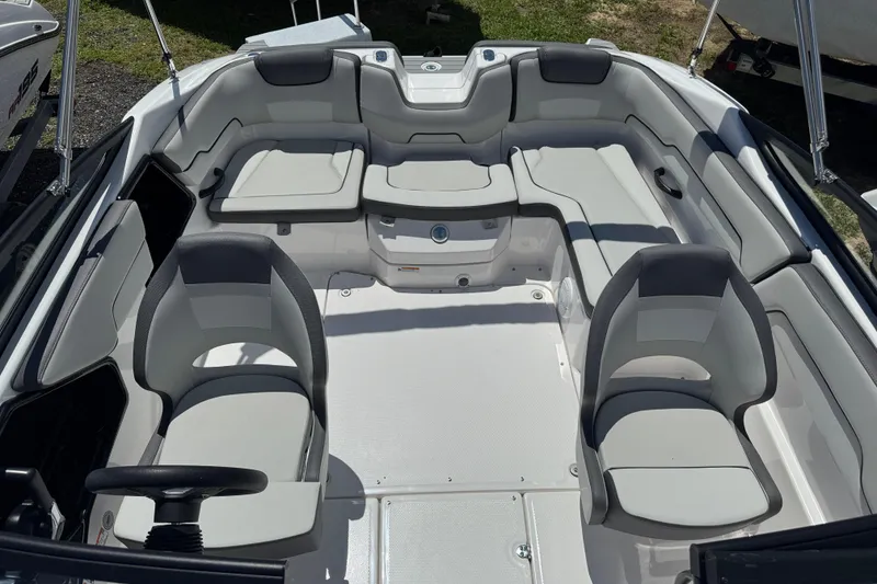 Slide: The Image of 2025 Yamaha Boats SX190 interior with spacious seating and modern design. - 9