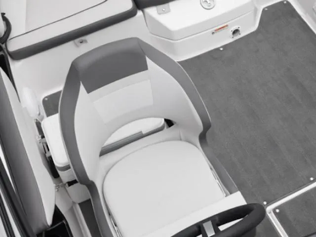 Slide: The Image of 2025 Yamaha Boats SX190 interior with gray and white seating and steering wheel. - 5