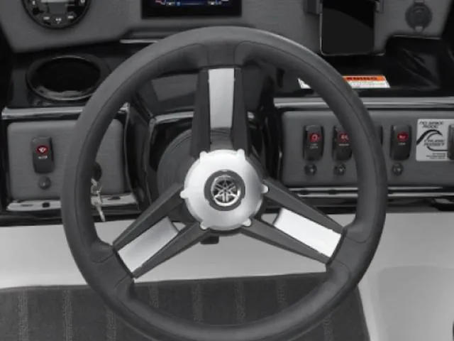 Slide: The Image of Steering wheel of 2025 Yamaha Boats SX190, featuring modern dashboard controls. - 6