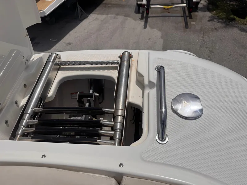 Slide: The Image of 2014 Boston Whaler 270 Vantage boat ladder and deck detail. - 15