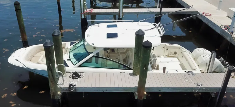 Slide: The Image of 2017 Boston Whaler 320 Vantage docked at marina, aerial view. - 16