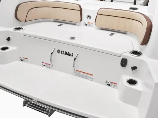 Slide: The Image of 2025 Yamaha Boats 255 FSH Sport H, rear seating and deck view. - 6