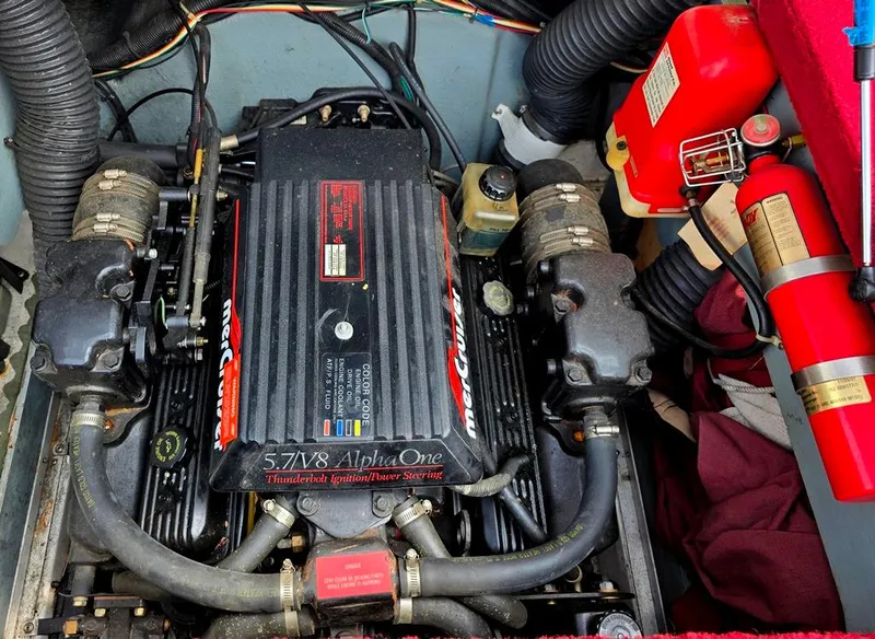 Slide: The Image of Engine compartment of a 1994 Sea Ray 220 Overnighter with MerCruiser 5.7L V8 engine. - 16