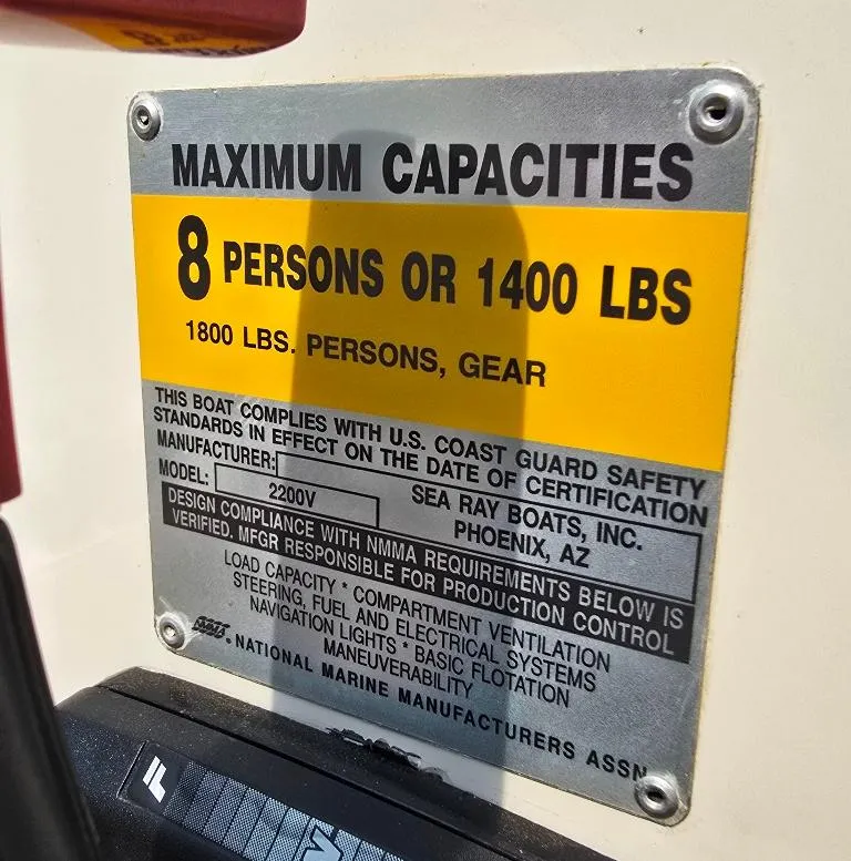 Slide: The Image of Capacity label on 1994 Sea Ray 220 Overnighter, max 8 persons or 1400 lbs. - 20
