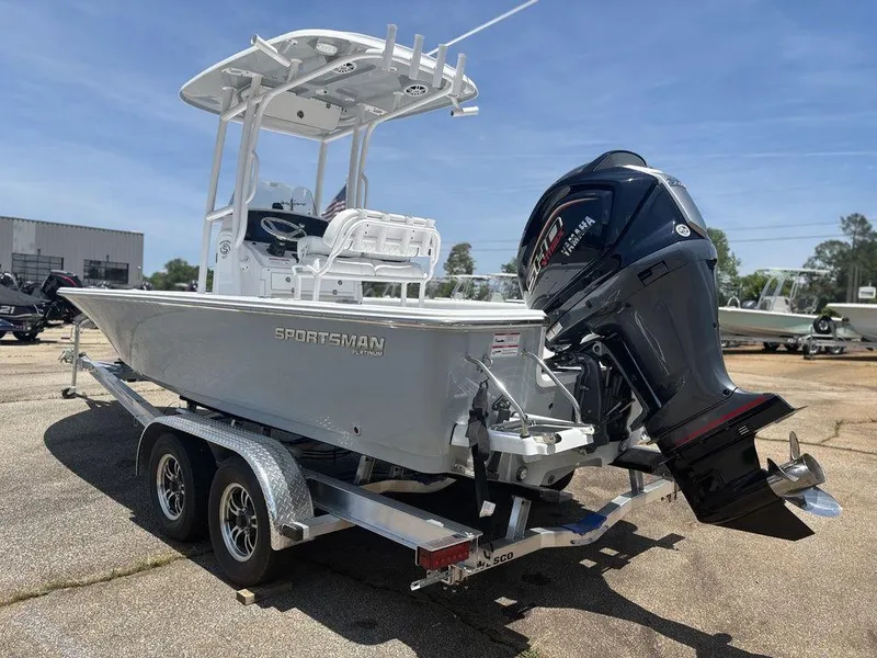 Slide: The Image of 2024 Sportsman Masters 227 Bay boat on trailer with powerful outboard motor. - 3